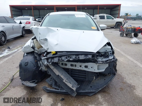 2018 Ford Focus SE z VIN 1FADP3F21JL257262, wystawiony jako IAAI lot #42174952 z przebiegiem 138 872 mil mil oraz . Historia ofert i sprzedaży dostępna na DreamBid. Obrazek 13.