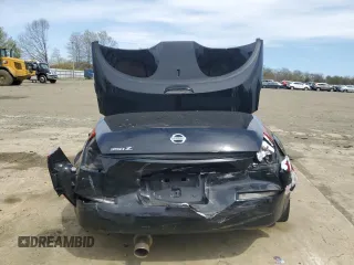 2004 Nissan 350Z Touring z VIN JN1AZ36A74M252230, wystawiony jako Copart lot #53355875 z przebiegiem 77 820 mil mil oraz Szkoda całkowita • Salvage title. Historia ofert i sprzedaży dostępna na DreamBid. Obrazek 6.