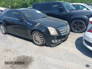 2011 Cadillac CTS Premium with VIN 1G6DS5ED4B0105859, listed as a IAAI auction lot 42494741 with 143,128 mi miles and . Bid and sale history available at DreamBid. Image 6.