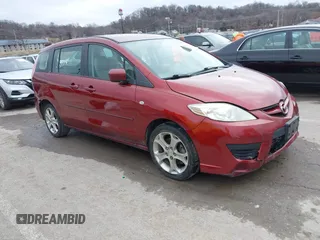 2009 Mazda Mazda5 Sport with VIN JM1CR293X90339440, listed as a IAAI auction lot 41525453 with 173,640 mi miles. Bid and sale history available at carsss.com. Image 1.