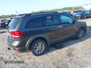 2015 Dodge Journey SXT with VIN 3C4PDCBG8FT707650, listed as a IAAI auction lot 41937738 with 217,318 mi miles and . Bid and sale history available at DreamBid. Image 4.