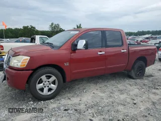 2004 Nissan Titan LE with VIN 1N6AA07A24N526183, listed as a Copart auction lot 55916605 with 172,615 mi miles and Salvage title. Bid and sale history available at DreamBid. Image 1.