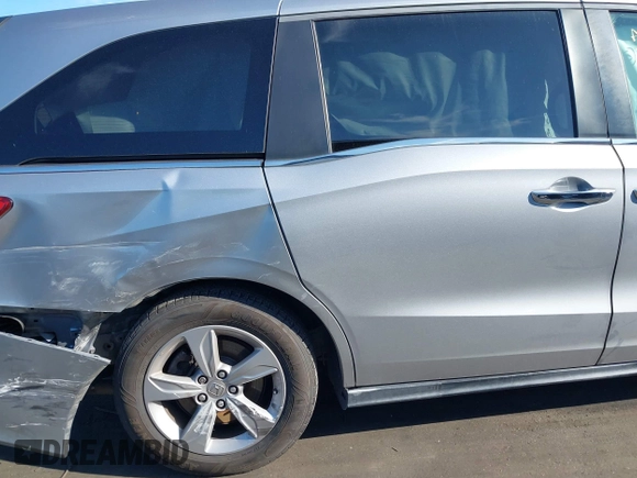2018 Honda Odyssey EX-L with VIN 5FNRL6H71JB089289, listed as a IAAI auction lot 41813322 with 94,933 mi miles and . Bid and sale history available at DreamBid. Image 18.