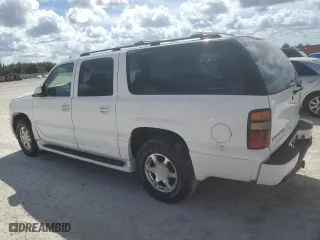 2004 GMC Yukon XL Denali with VIN 1GKFK66U84J258384, listed as a Copart auction lot 76179964 with 0 mi miles and Salvage Title. Bid and sale history available at carsss.com. Image 2.