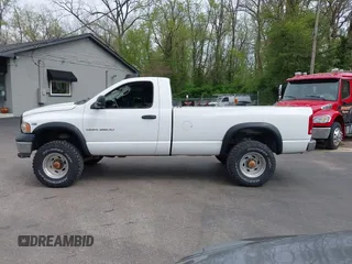 2003 Dodge Ram 2500 ST with VIN 3D7KU26DX3G717885, listed as a IAAI auction lot 42044011 with 149,752 mi miles. Bid and sale history available at carsss.com. Image 14.