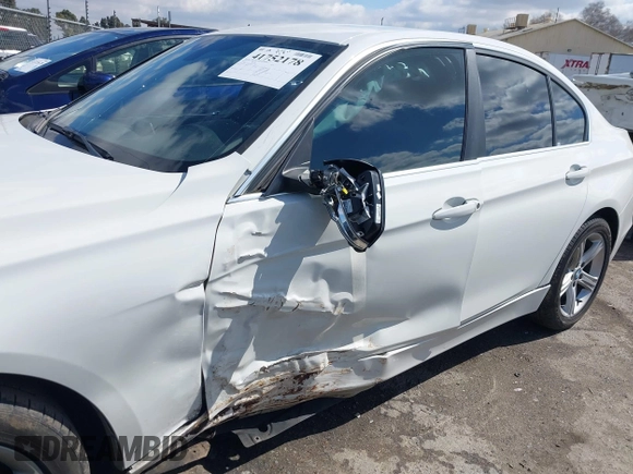 2015 BMW 3 Series 328i with VIN WBA3C1C5XFK117788, listed as a IAAI auction lot 41752178 with 154,030 mi miles and . Bid and sale history available at carsss.com. Image 6.
