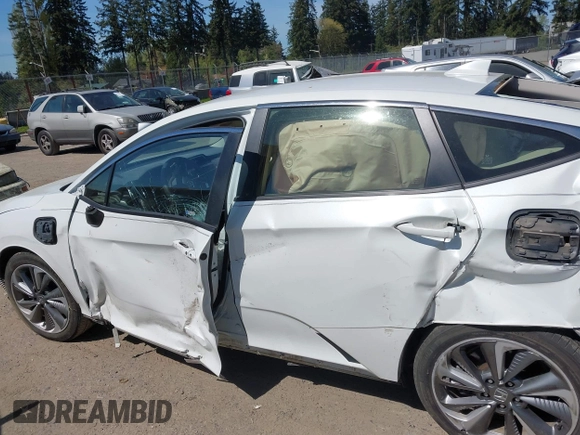 2019 Honda Clarity with VIN JHMZC5F1XKC007033, listed as a IAAI auction lot 42064611 with 28,458 mi miles. Bid and sale history available at carsss.com. Image 14.
