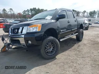 2013 Nissan Titan S with VIN 1N6AA0EC5DN304015, listed as a IAAI auction lot 41828891 with 136,279 mi miles and . Bid and sale history available at DreamBid. Image 2.