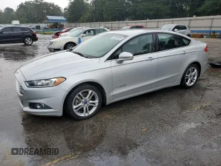 2016 Ford Fusion SE Hybrid with VIN 3FA6P0LUXGR350997, listed as a Copart auction lot 62301825 with 267,537 mi miles and Salvage title. Bid and sale history available at DreamBid. Image 1.