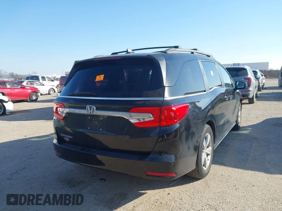 2018 Honda Odyssey EX-L z VIN 5FNRL6H74JB031306, wystawiony jako IAAI lot #41603478 z przebiegiem Nie podano mil oraz . Historia ofert i sprzedaży dostępna na DreamBid. Obrazek 4.