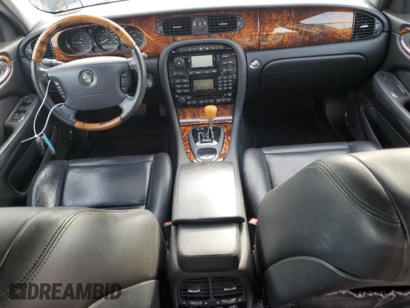 2004 Jaguar XJ with VIN SAJEA71C94SG11566, listed as a Copart auction lot 85281684 with 107,054 mi miles and Clean Title. Bid and sale history available at carsss.com. Image 8.