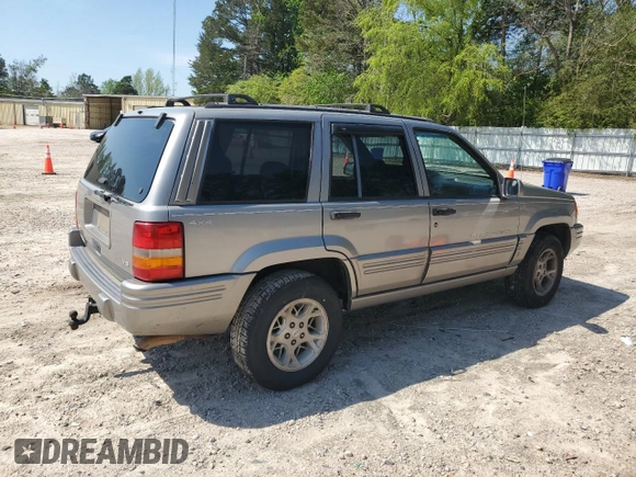 1998 Jeep Grand Cherokee Limited with VIN 1J4GZ78YXWC160346, listed as a Copart auction lot 52595655 with Not provided miles and Salvage title. Bid and sale history available at DreamBid. Image 3.