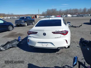 2021 Acura TLX Technology z VIN 19UUB6F41MA006805, wystawiony jako IAAI lot #41869747 z przebiegiem 59 228 mil mil oraz . Historia ofert i sprzedaży dostępna na DreamBid. Obrazek 17.