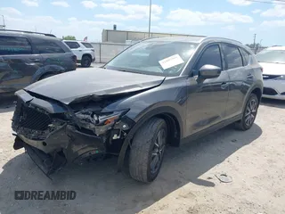 2017 Mazda CX-5 Grand Touring with VIN JM3KFADL3H0227655, listed as a IAAI auction lot 41897981 with 103,545 mi miles. Bid and sale history available at carsss.com. Image 17.