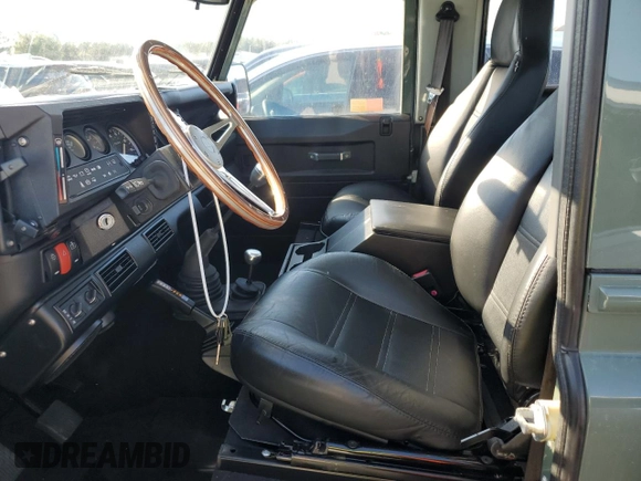 1992 Land Rover Defender with VIN SALLDVAF8JA917701, listed as a Copart auction lot 73864824 with 4,284 mi miles and Salvage title. Bid and sale history available at DreamBid. Image 7.