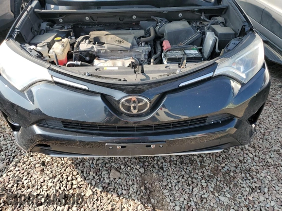 2018 Toyota RAV4 XLE with VIN 2T3RFREV0JW765995, listed as a Copart auction lot 63968785 with 114,598 mi miles and Salvage title. Bid and sale history available at DreamBid. Image 12.