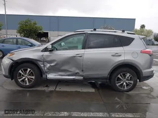 2016 Toyota RAV4 XLE with VIN 2T3WFREV7GW251931, listed as a IAAI auction lot 41906274 with 55,700 mi miles. Bid and sale history available at carsss.com. Image 15.