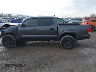 2016 Toyota Tacoma SR5 with VIN 5TFAX5GN1GX056450, listed as a IAAI auction lot 41215339 with 129,604 mi miles. Bid and sale history available at carsss.com. Image 15.