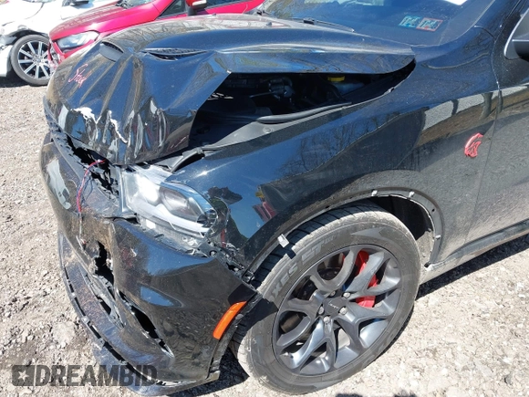2023 Dodge Durango SRT Hellcat Premium with VIN 1C4SDJH91PC687665, listed as a IAAI auction lot 42070800 with 65,787 mi miles and . Bid and sale history available at DreamBid. Image 6.