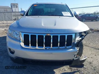 2013 Jeep Grand Cherokee Laredo with VIN 1C4RJFAG3DC586667, listed as a IAAI auction lot 42041524 with 100,635 mi miles. Bid and sale history available at carsss.com. Image 17.
