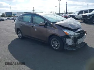 2016 Toyota Prius v Two with VIN JTDZN3EU0GJ042775, listed as a IAAI auction lot 41283162 with 220,882 mi miles. Bid and sale history available at carsss.com. Image 1.