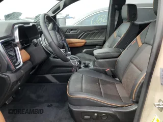 2023 GMC Canyon 4WD AT4 with VIN 1GTP6DEK3P1151112, listed as a Copart auction lot 77150454 with 5,573 mi miles and Non Repairable. Bid and sale history available at carsss.com. Image 7.