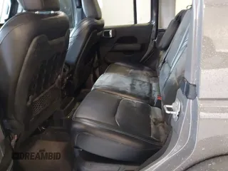 2021 Jeep Wrangler Unlimited Rubicon z VIN 1C4JJXR65MW675010, wystawiony jako IAAI lot #41990021 z przebiegiem 73 406 mil mil oraz . Historia ofert i sprzedaży dostępna na DreamBid. Obrazek 8.