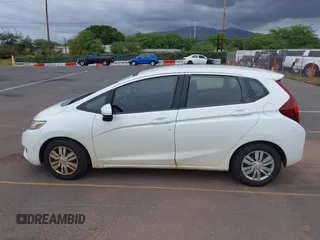 2016 Honda Fit LX z VIN JHMGK5H51GX038519, wystawiony jako IAAI lot #41809636 z przebiegiem 96 894 mil mil oraz . Historia ofert i sprzedaży dostępna na DreamBid. Obrazek 14.