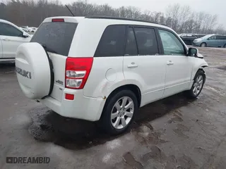 2011 Suzuki Grand Vitara Limited with VIN JS3TD0D70B4101173, listed as a IAAI auction lot 41513972 with 125,118 mi miles. Bid and sale history available at carsss.com. Image 4.