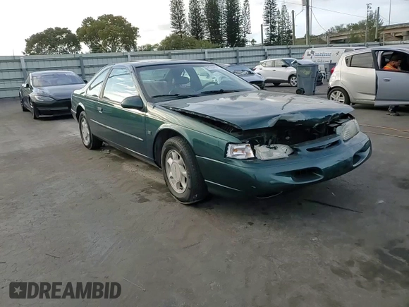1994 Ford Thunderbird LX with VIN 1FALP62W6RH128762, listed as a Copart auction lot 84306604 with 68,314 mi miles and Salvage Title. Bid and sale history available at DreamBid. Image 11.