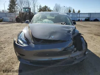 2019 Tesla Model 3 Long Range with VIN 5YJ3E1EB8KF452023, listed as a Copart auction lot 47389285 with 123,488 mi miles and Salvage Title. Bid and sale history available at carsss.com. Image 5.