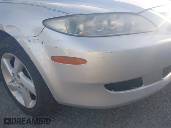 2003 Mazda 6 i with VIN 1YVFP80C235M36199, listed as a IAAI auction lot 41832818 with 169,470 mi miles and . Bid and sale history available at DreamBid. Image 6.
