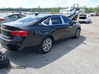 2016 Chevrolet Impala LT z VIN 2G1115S31G9128052, wystawiony jako IAAI lot #42302597 z przebiegiem 120 590 mil mil oraz . Historia ofert i sprzedaży dostępna na DreamBid. Obrazek 4.
