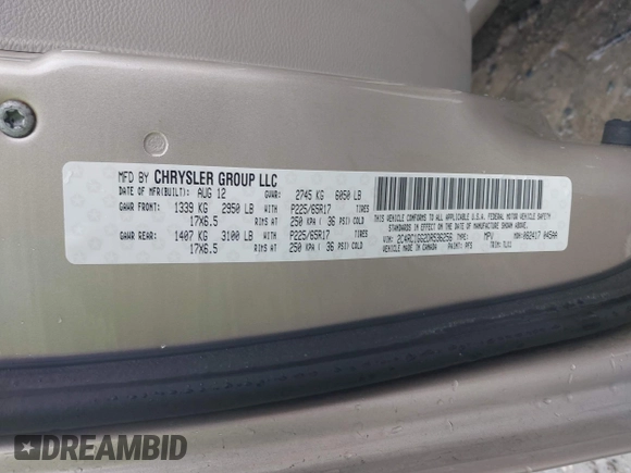 2013 Chrysler Town & Country Limited with VIN 2C4RC1GG2DR536256, listed as a IAAI auction lot 42027427 with 126,447 mi miles. Bid and sale history available at carsss.com. Image 9.