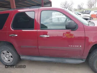 2007 Chevrolet Tahoe LTZ with VIN 1GNFK130X7J313106, listed as a IAAI auction lot 42042891 with 199,763 mi miles and . Bid and sale history available at DreamBid. Image 13.