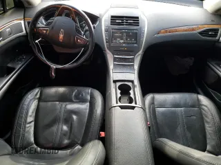 2016 Lincoln MKZ z VIN 3LN6L2G97GR614647, wystawiony jako Copart lot #55955655 z przebiegiem 142 655 mil mil oraz Szkoda całkowita • Salvage title. Historia ofert i sprzedaży dostępna na DreamBid. Obrazek 8.