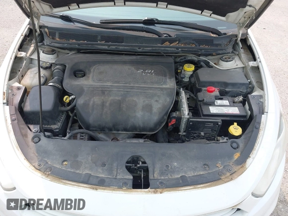 2013 Dodge Dart SXT with VIN 1C3CDFBA7DD270792, listed as a IAAI auction lot 42386977 with 204,715 mi miles and . Bid and sale history available at DreamBid. Image 10.