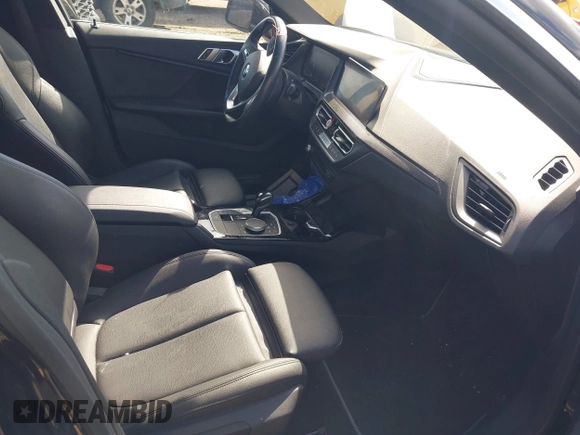 2021 BMW 2 Series 228i xDrive with VIN WBA73AK08M7J51154, listed as a IAAI auction lot 42168185 with 52,167 mi miles and . Bid and sale history available at DreamBid. Image 5.