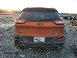 2016 Jeep Cherokee Trailhawk with VIN 1C4PJMBSXGW286822, listed as a Copart auction lot 42823545 with 66,898 mi miles and Salvage title. Bid and sale history available at DreamBid. Image 6.