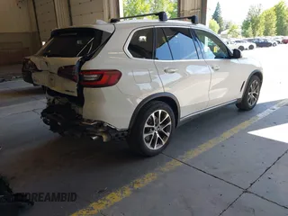 2022 BMW X5 xDrive40i with VIN 5UXCR6C09N9M21945, listed as a IAAI auction lot 42170363 with 23,537 mi miles and . Bid and sale history available at DreamBid. Image 4.