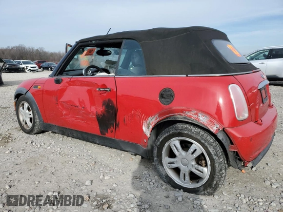 2005 MINI Convertible with VIN WMWRF33525TG12494, listed as a Copart auction lot 43010175 with Not provided miles and Salvage title. Bid and sale history available at DreamBid. Image 2.