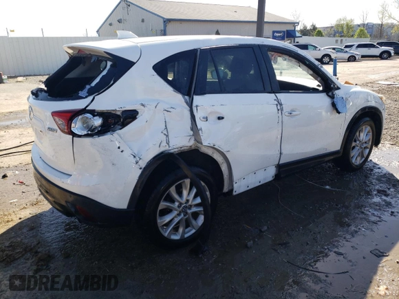 2014 Mazda CX-5 Grand Touring with VIN JM3KE4DY6E0376413, listed as a Copart auction lot 53204935 with 126,791 mi miles and Salvage Title. Bid and sale history available at DreamBid. Image 3.