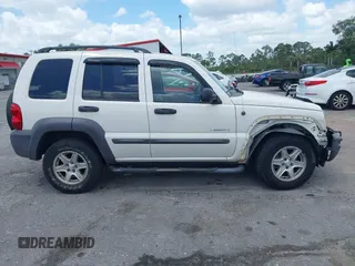2004 Jeep Liberty Sport with VIN 1J4GK48K54W153217, listed as a IAAI auction lot 42071897 with 106,921 mi miles and . Bid and sale history available at carsss.com. Image 14.