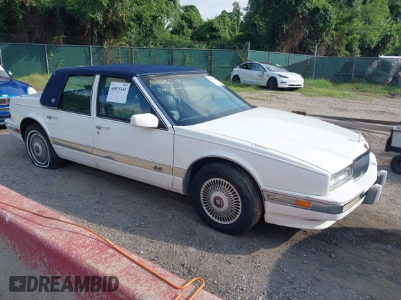 1991 Cadillac Seville z VIN 1G6KS53B9MU820155, wystawiony jako IAAI lot #40035441 z przebiegiem 78 021 mil mil oraz . Historia ofert i sprzedaży dostępna na DreamBid. Obrazek 1.