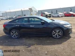 2016 Nissan Maxima SL with VIN 1N4AA6APXGC421111, listed as a IAAI auction lot 41803879 with 133,418 mi miles and . Bid and sale history available at DreamBid. Image 13.