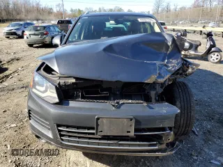2012 Volkswagen Touareg Lux с VIN WVGEK9BP1CD008132, выставлен на аукционе Copart как лот 49501765 с пробегом 156 594 миль миль и Списание • Salvage title. История ставок и продаж доступна на DreamBid. Изображение 5.