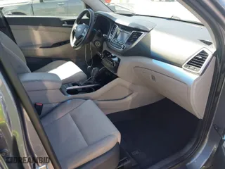 2016 Hyundai Tucson Eco with VIN KM8J3CA24GU230264, listed as a IAAI auction lot 41968258 with 157,951 mi miles. Bid and sale history available at carsss.com. Image 5.