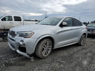 2017 BMW X4 M40i with VIN 5UXXW7C57H0U25268, listed as a Copart auction lot 40370884 with 99,387 mi miles. Bid and sale history available at carsss.com. Image 1.