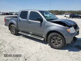 2019 Nissan Frontier Desert Runner with VIN 1N6DD0ER1KN755755, listed as a Copart auction lot 51008615 with 77,462 mi miles and Salvage title. Bid and sale history available at DreamBid. Image 4.