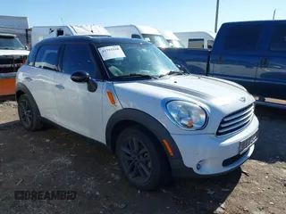 2014 MINI Countryman with VIN WMWZB3C53EWR37680, listed as a IAAI auction lot 41752558 with 141,076 mi miles and . Bid and sale history available at DreamBid. Image 1.